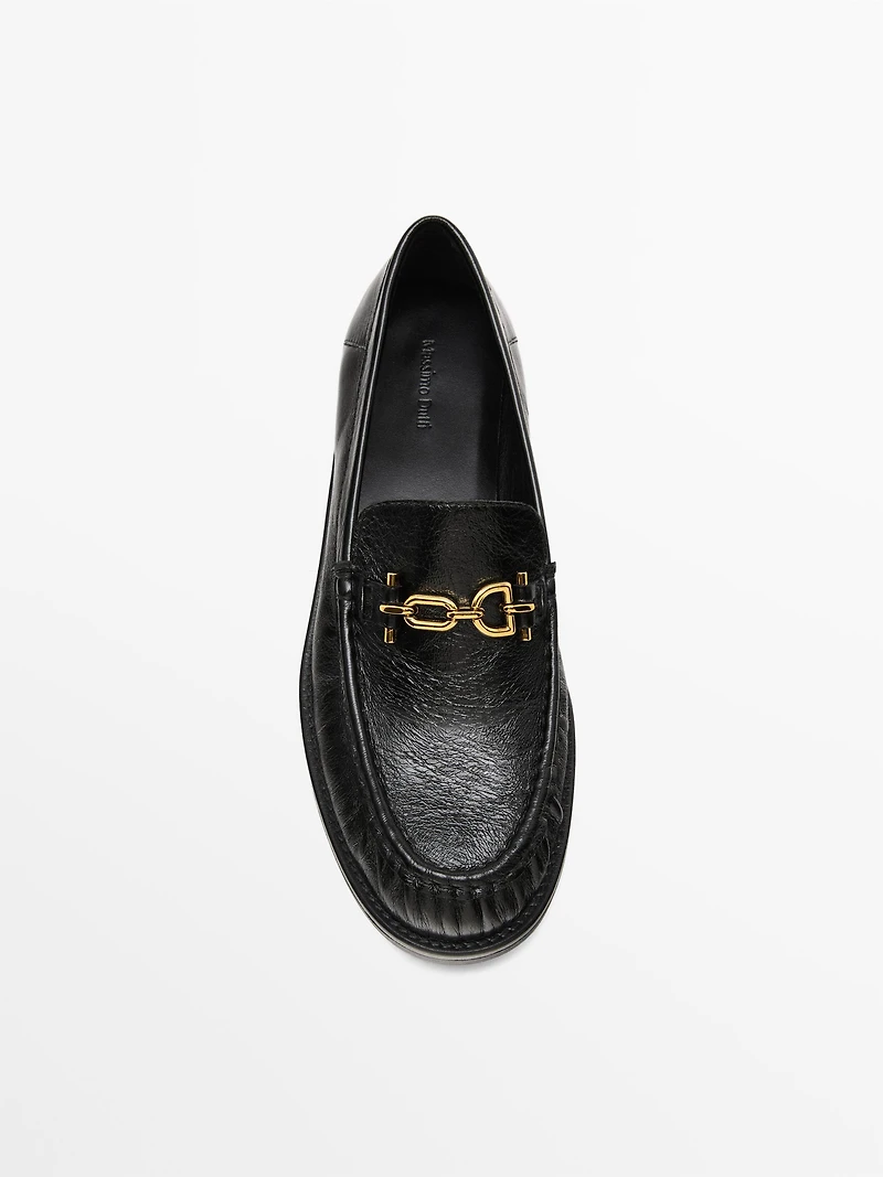 Crackled leather loafers with decorative detail