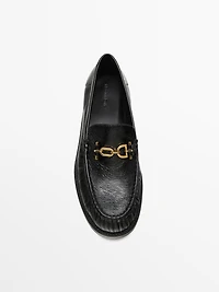 Crackled leather loafers with decorative detail