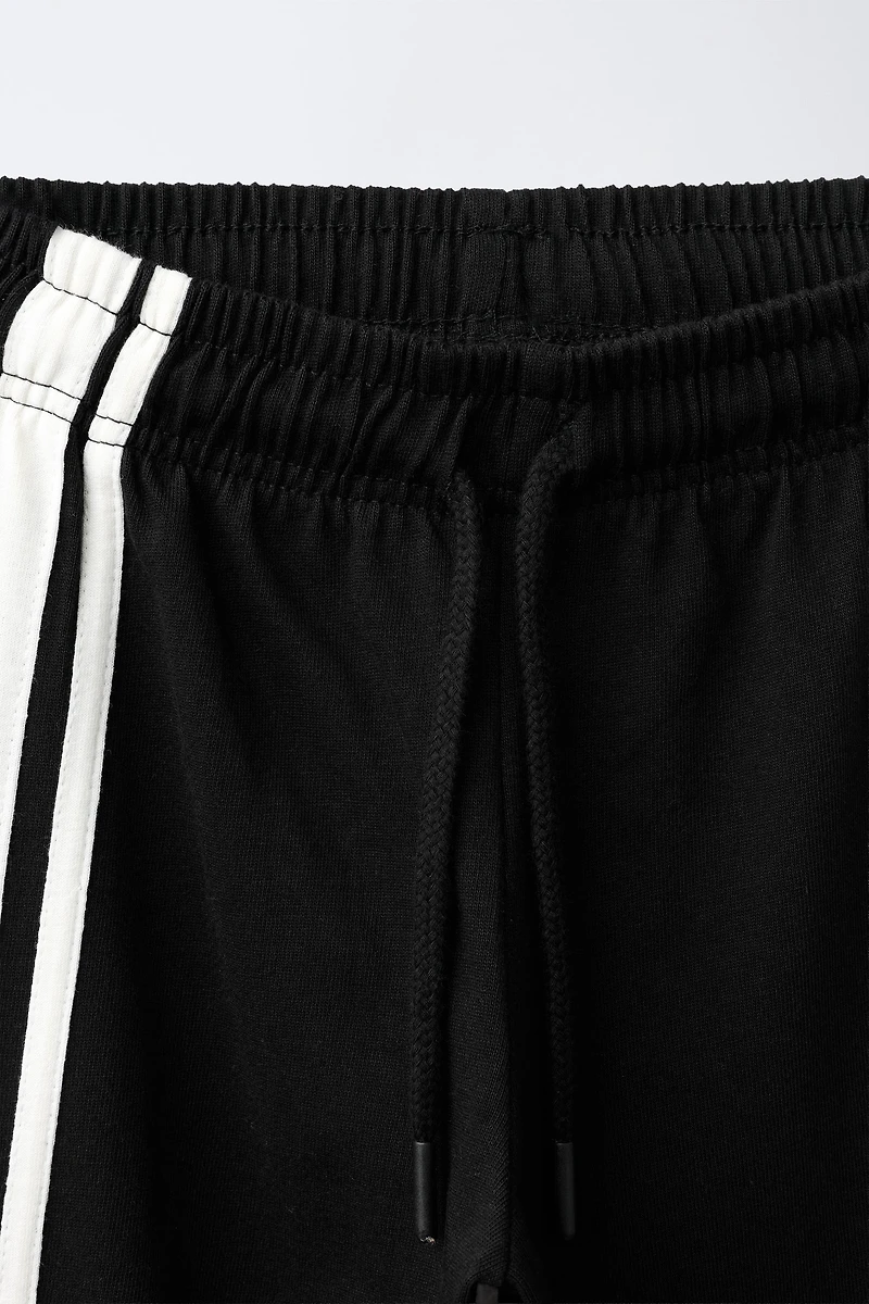 WIDE LEG PANTS WITH SIDE STRIPES