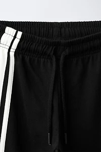WIDE LEG PANTS WITH SIDE STRIPES