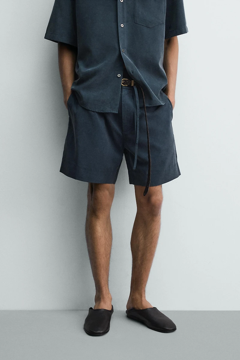 WASHED EFFECT RELAXED FIT SHORTS