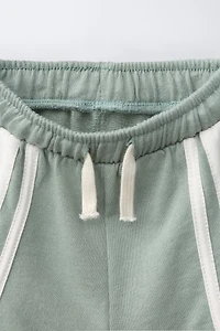SHORT À BANDES LATÉRALES