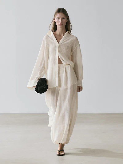 Flowing shirt with pleated detail