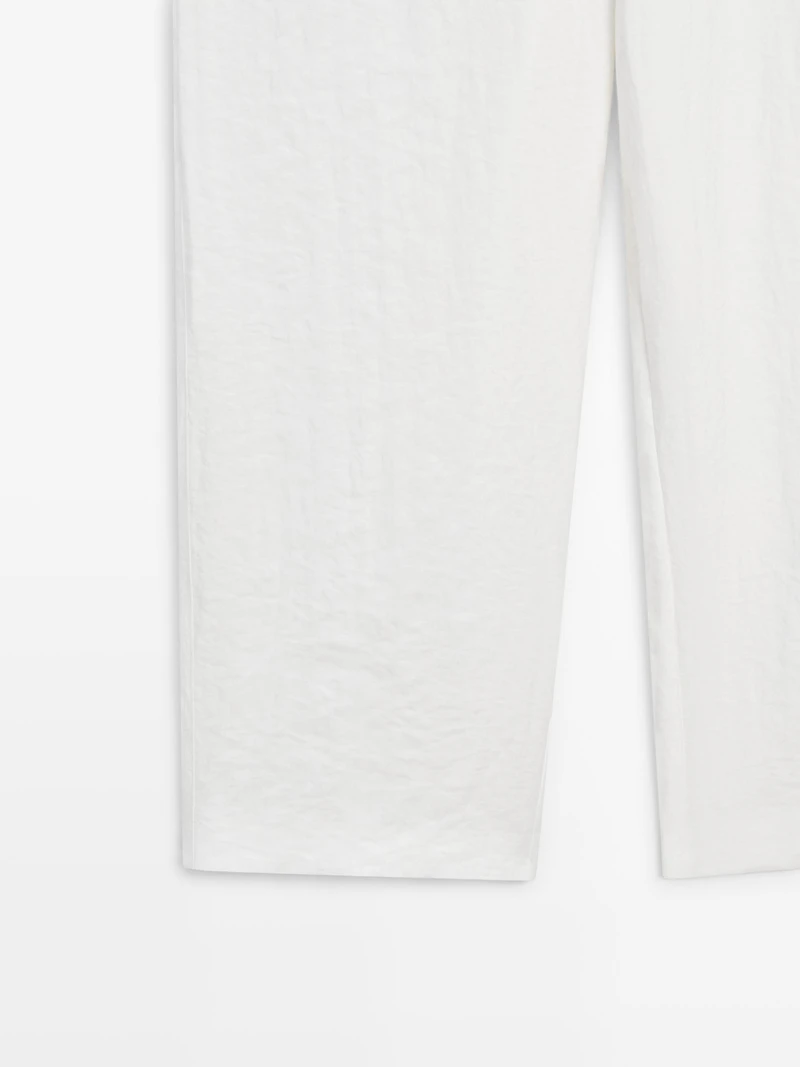 Flowing trousers with buckles