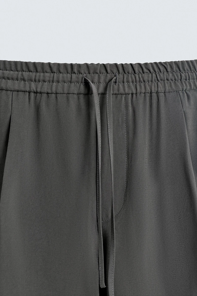 FLOWY TOPSTITCHED PANTS