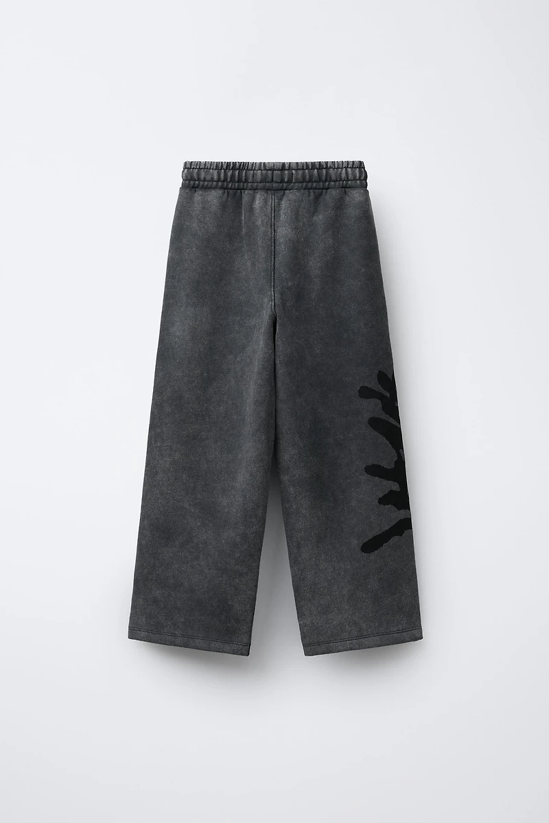 GRAFFITI WASHED EFFECT WIDE LEG PLUSH PANTS