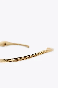 COLLIER RAS DU COU TEXTURÉ