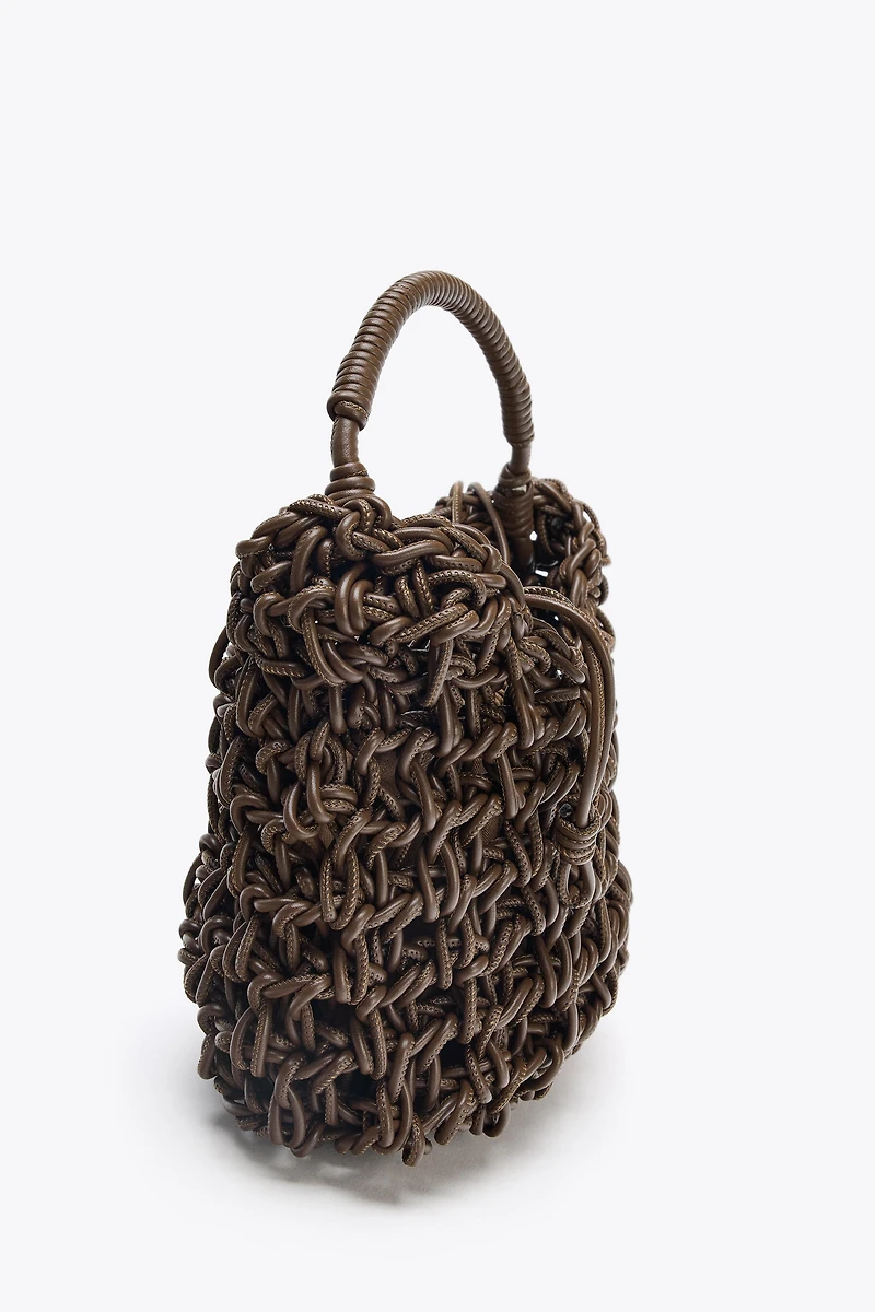 SAC À MAIN TRESSÉ SURPIQÛRES