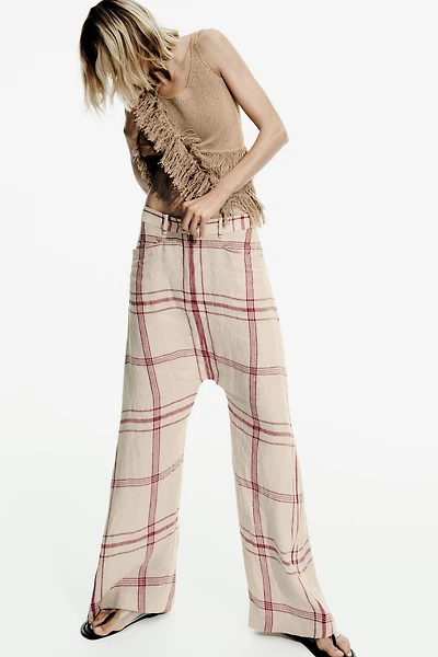 FRINGED KNIT TOP