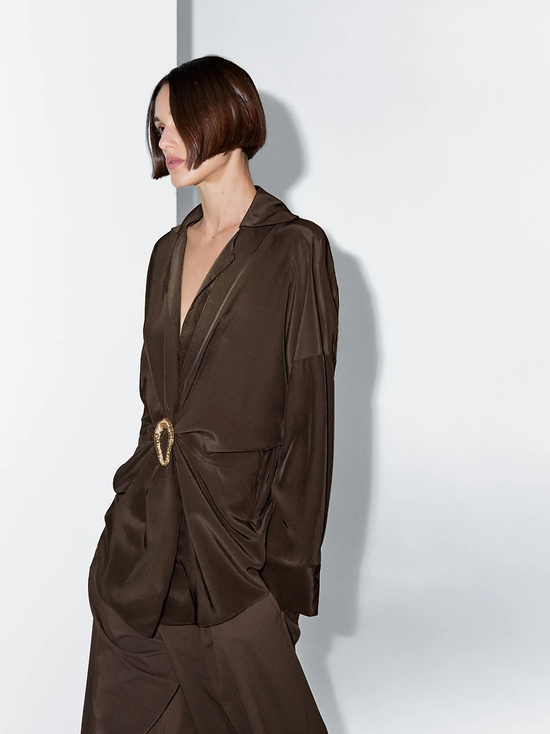 Long shirt with brooch detail