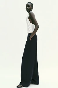 HALTER NECK JUMPSUIT WITH BELT