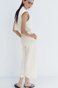 FLAP SHORT VEST