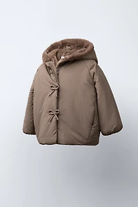 WATER REPELLENT PUFFER COAT WITH BOWS