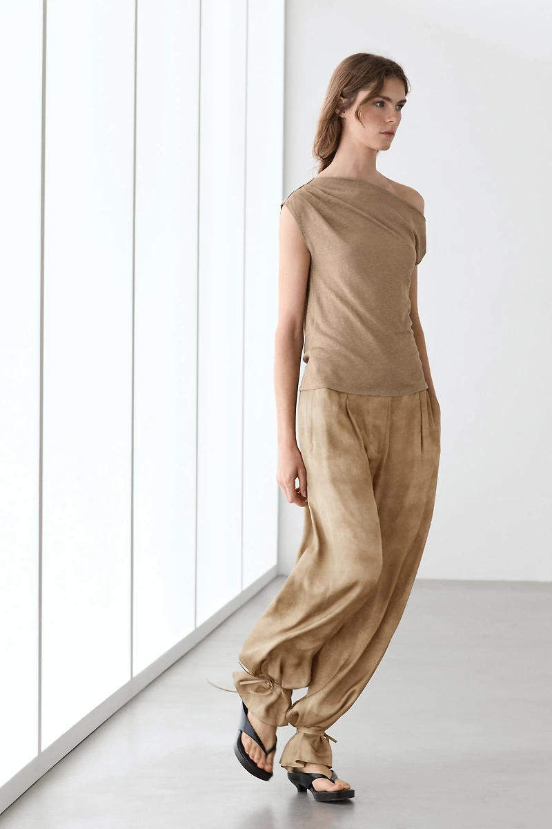Asymmetric linen blend top with draped detail