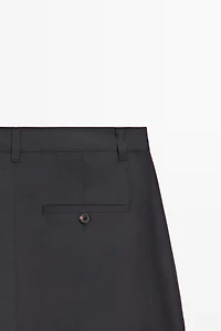 Cotton blend wide-leg pleated trousers