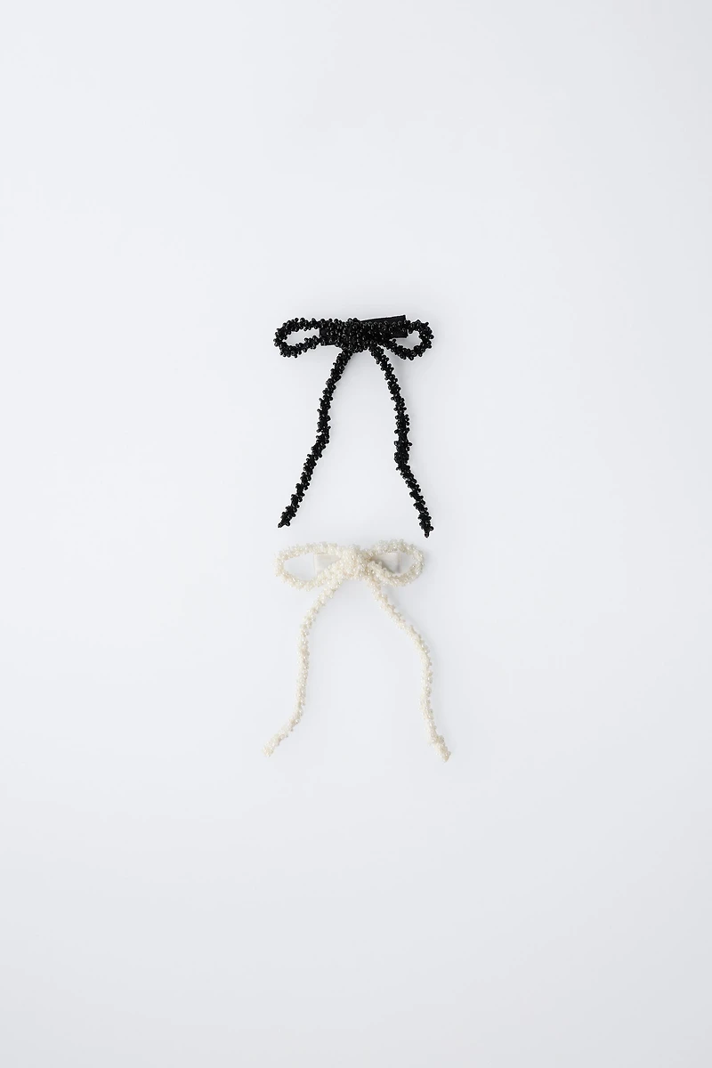 LOT DE DEUX PINCES À CHEVEUX AVEC FANTASIE