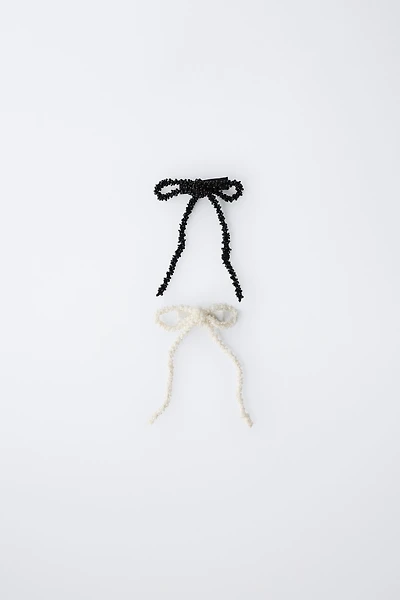 LOT DE DEUX PINCES À CHEVEUX AVEC FANTASIE