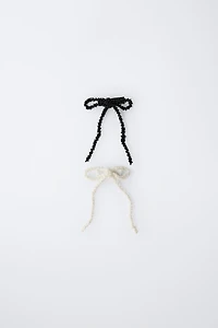 LOT DE DEUX PINCES À CHEVEUX AVEC FANTASIE