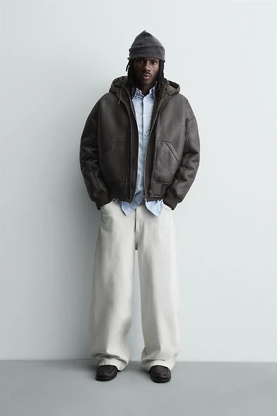 BLOUSON EN MATIÈRE SYNTHÉTIQUE DOUBLE FACE