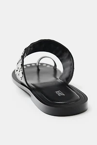 FLAT LEATHER SANDALS WITH STUDS