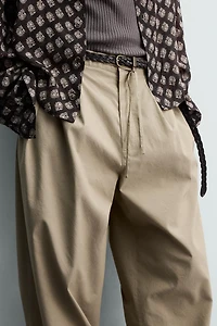 BALLOON FIT PLEATED PANTS