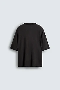 T-SHIRT EN MAILLES IMPRIMÉ DÉLAVÉ