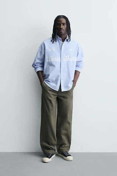 PRINTED TEXT OXFORD BOXY FIT SHIRT