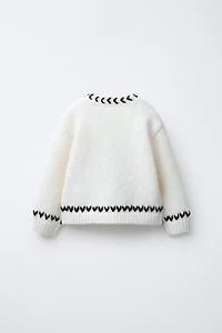 KNIT JUMPER WITH PIPING