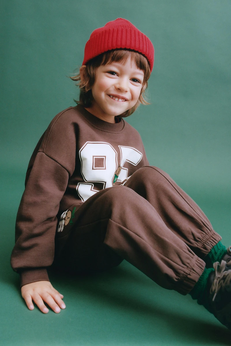 EMBROIDERED ANIMAL NUMBER JOGGING PANTS