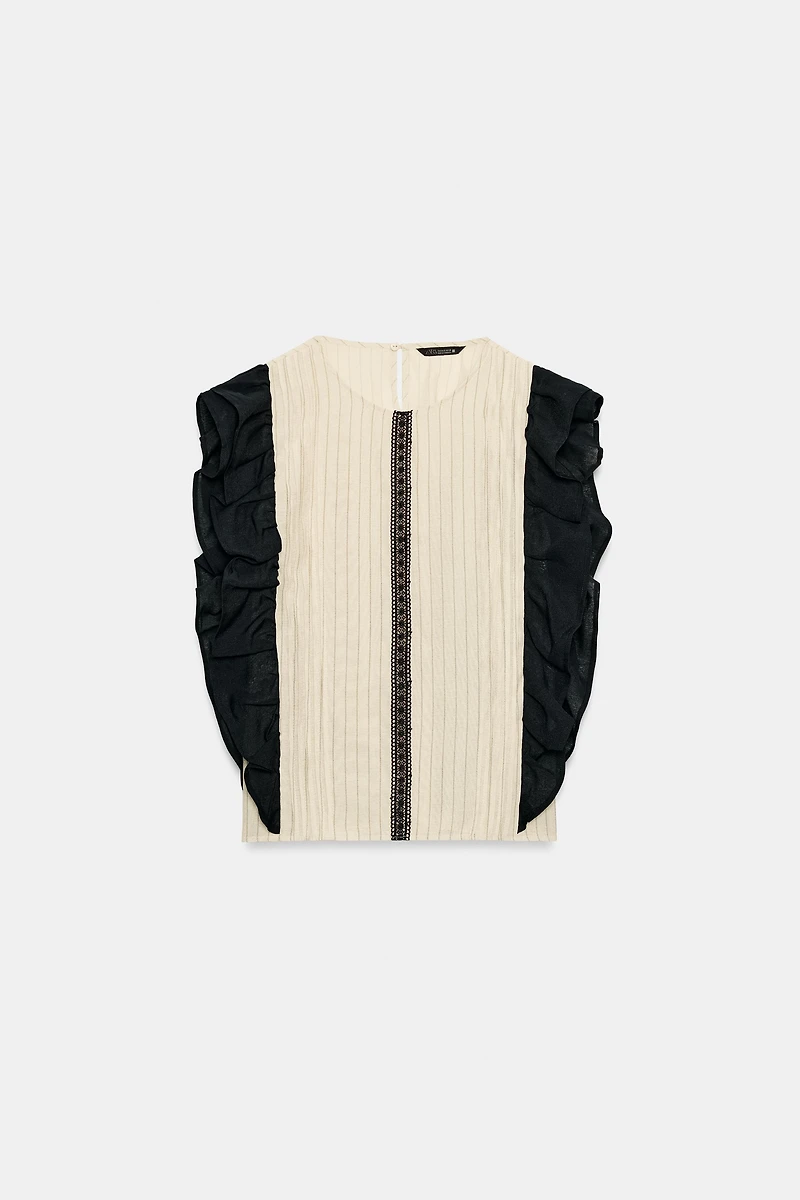 BLOUSE À RAYURES ET VOLANTS