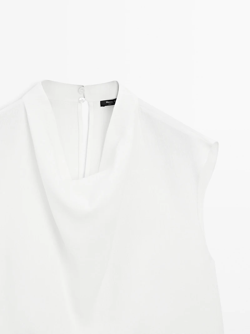 Flowing blouse with draped collar