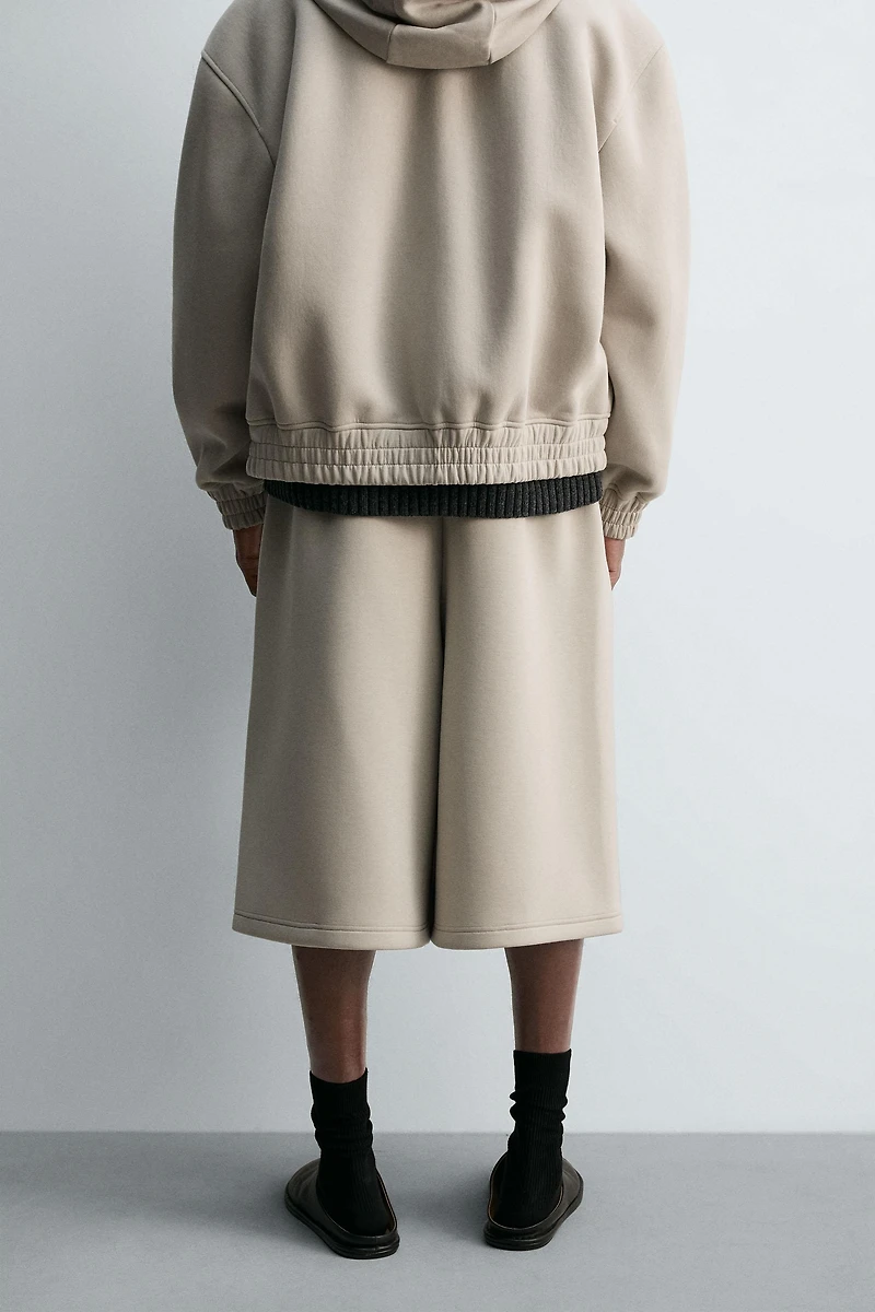 SHORT LONG EFFET NÉOPRÈNE À PINCES