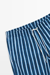 Tri-color striped swimming trunks