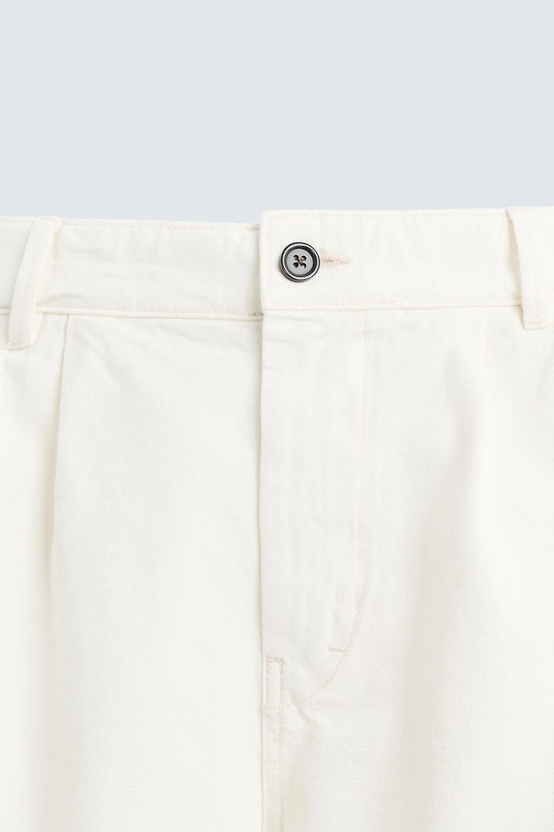 RELAXED FIT PLEATED BERMUDA SHORTS