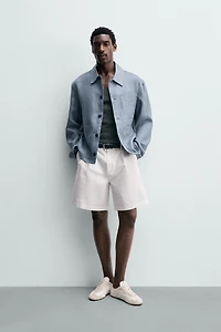 BERMUDA RELAXED FIT À PLIS