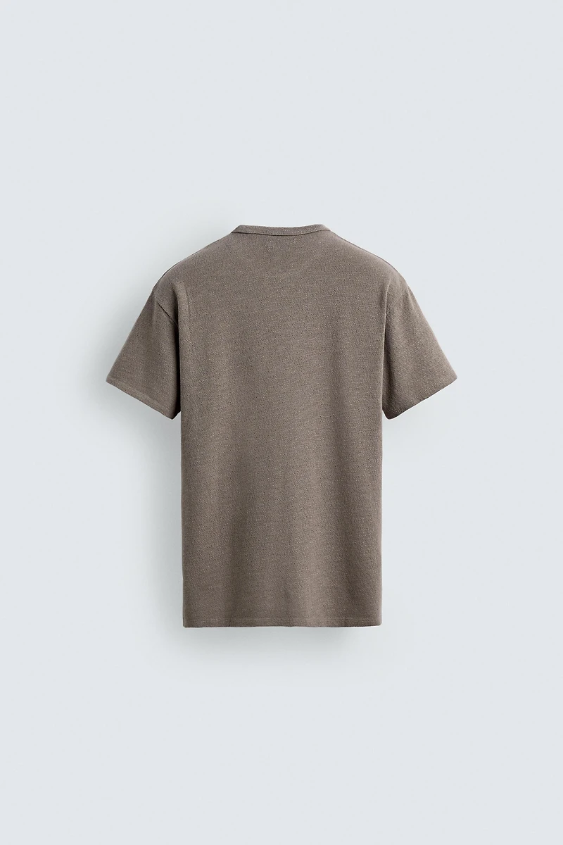 T-SHIRT EN MAILLE LAVÉE À PIÈCES