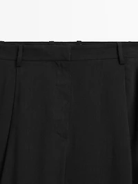 Flowing linen blend trousers with darts