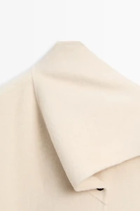 Short coat with scarf detail