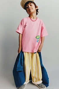 PANTALON À RAYURES VAGUES