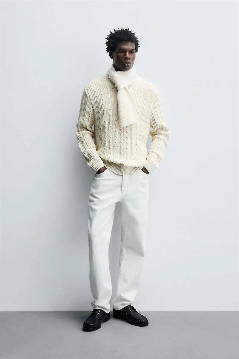 TEXTURED WOVEN SWEATER