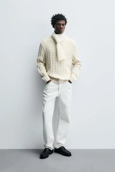 TEXTURED WOVEN SWEATER