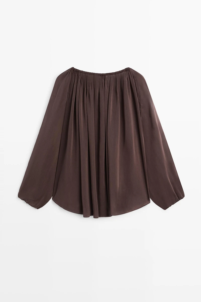 Flowing shirt with gathered details
