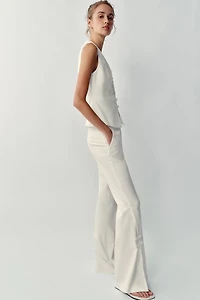 PANTALON À OUVERTURES SUR LE BAS