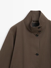 Mid-length trench coat with belt detail