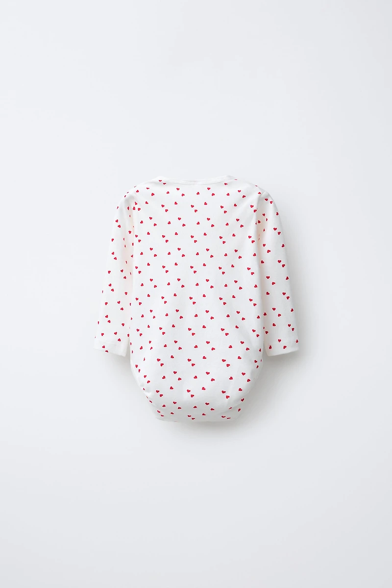 THREE-PACK OF HEART BODYSUITS