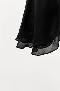 TOP À VOLANTS EN MATIÈRES VARIÉES