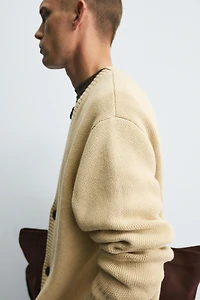 DISTRESSED RIBBED CARDIGAN