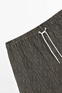 Striped print swimming trunks
