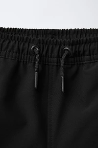 TECHNICAL LOGO SHORTS