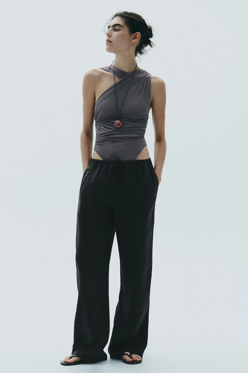 DRAPED ASYMMETRIC TULLE BODYSUIT